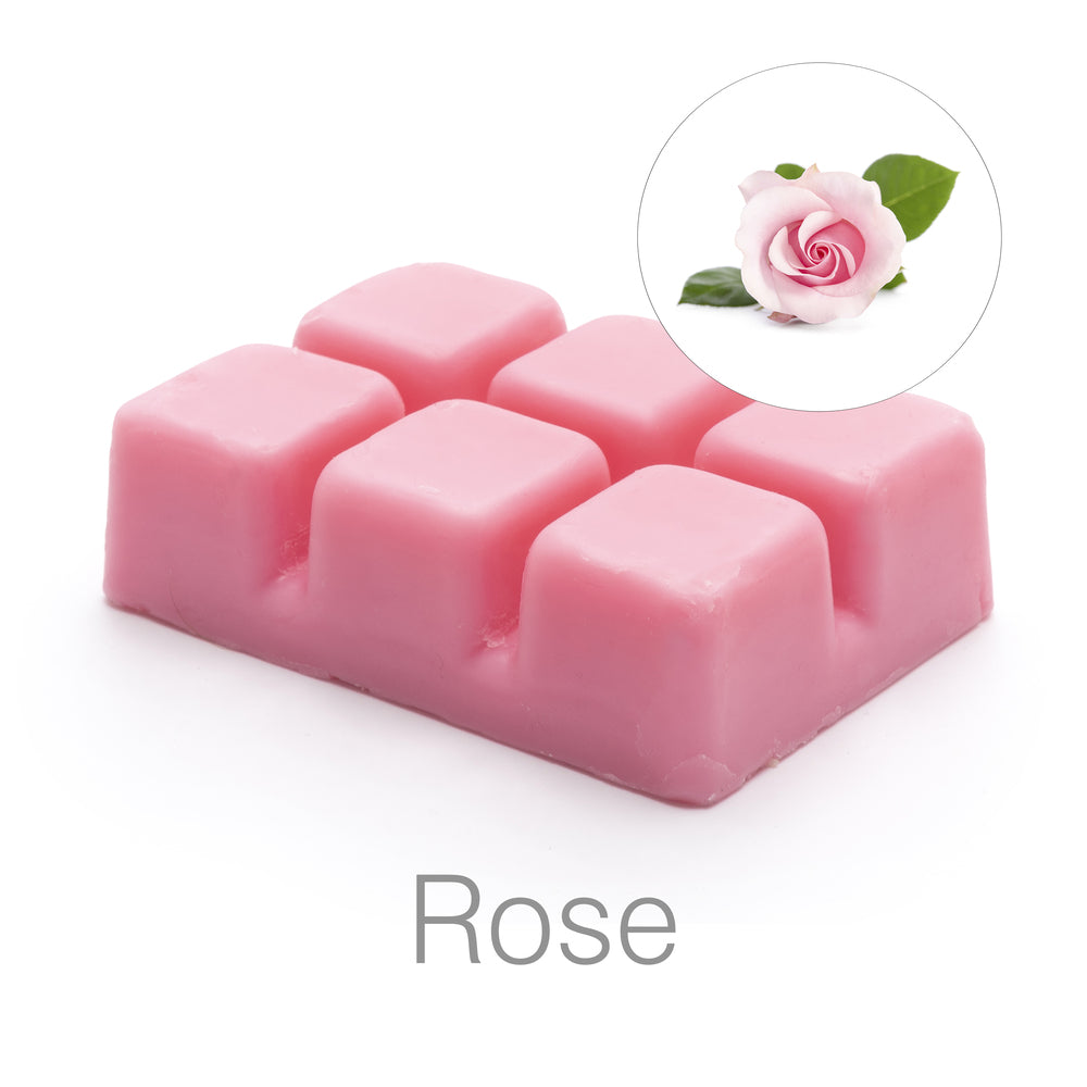 The Rio Scented Soy Wax Melt - Rose Fragrance features a pink bar with six cubes, shown below a pale pink rose inset. Rose appears beneath, ideal for enjoying beautiful scent in your favorite wax burners.