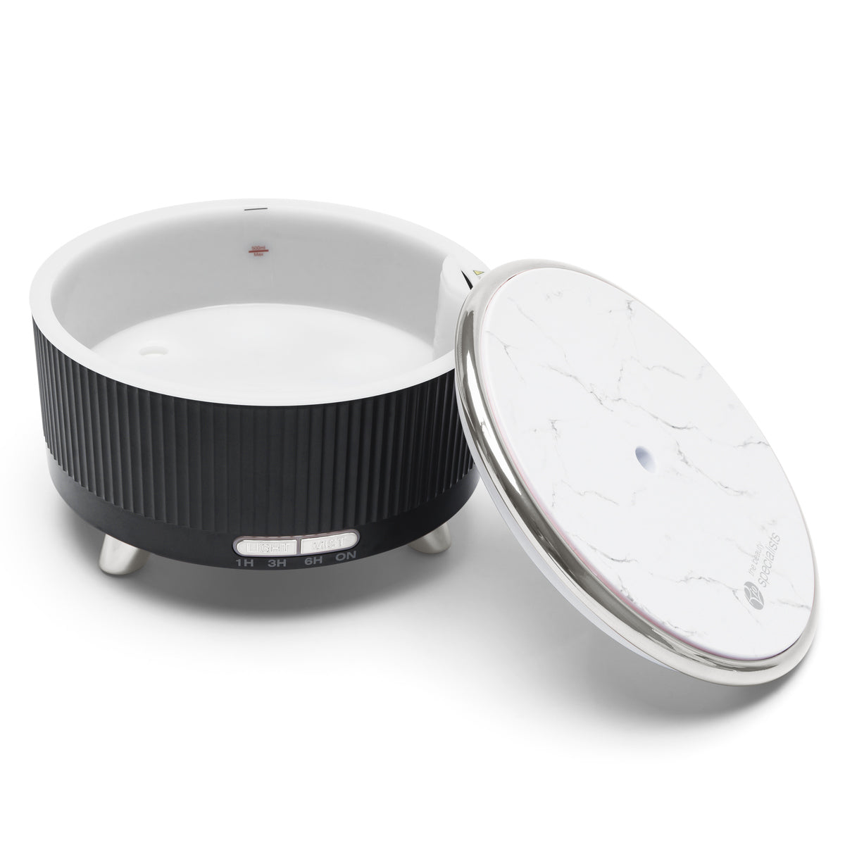 The SONAS Aroma Diffuser, Humidifier & Night-Light by Rio is a round black and white unit with a marble-patterned lid, small legs, timer control switch, and provides humidifying moisture ideal for aromatherapy oils.