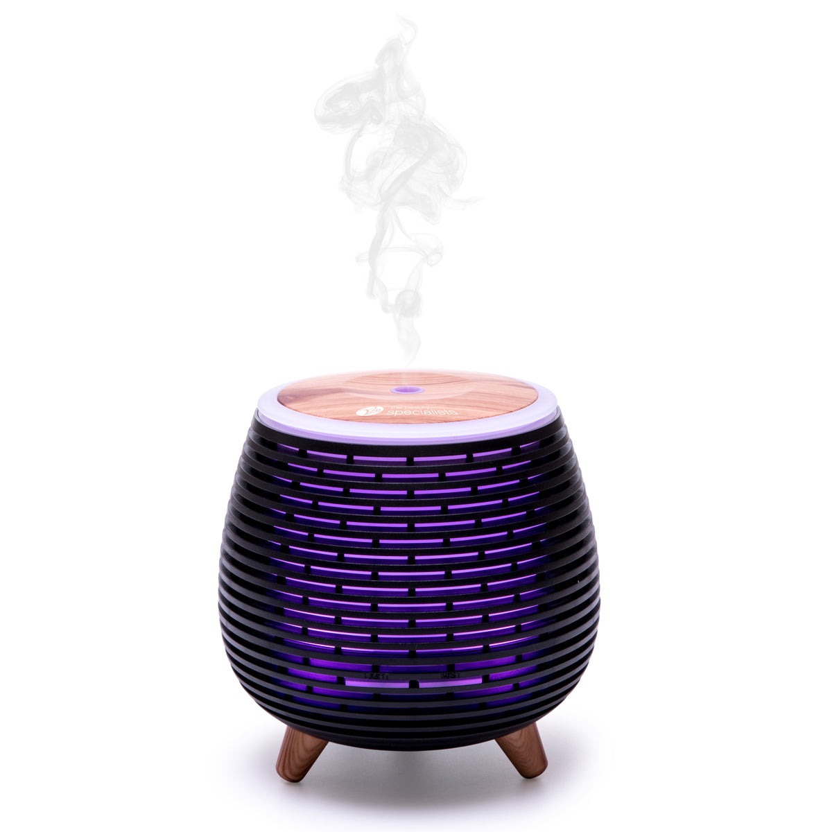 The Rio ZOEY Aroma Diffuser, Humidifier & Night-Light features a black and wood design with purple light accents, emitting visible mist from its three wooden legs for a calming ambiance against a white background.