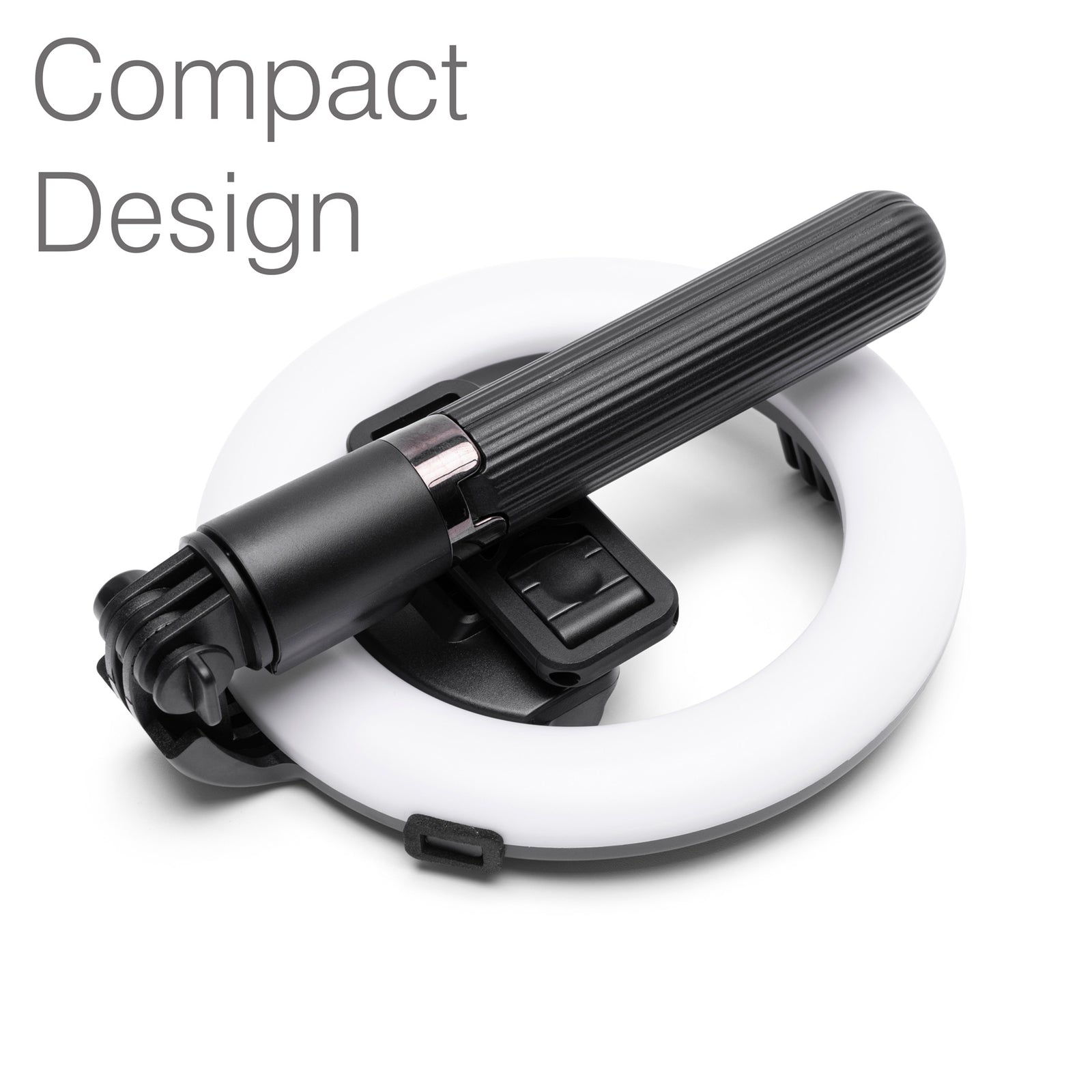 The Rio GlamourGlow Pro Beauty & Vlogging Ring Light features a black handheld device with a ribbed grip resting on its white circular light, perfect for vlogging. “Compact Design” is displayed in the top left corner.