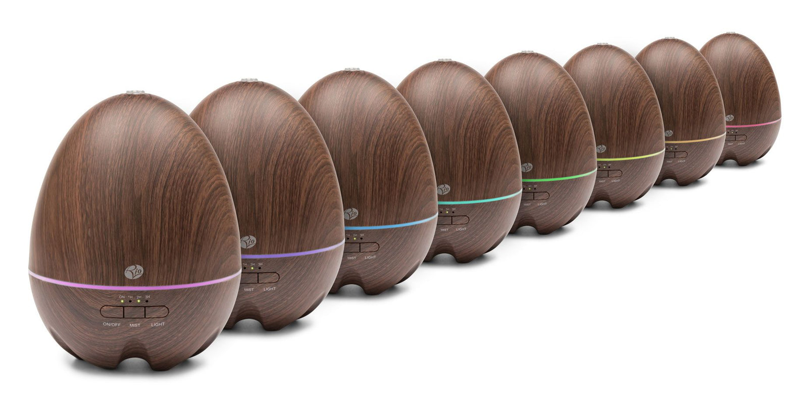 A row of eight Rio ARIA Aroma Diffuser Humidifier and Nightlights, each with a unique colored light ring near the base, brings relaxation and elegant décor to any space against a white background.