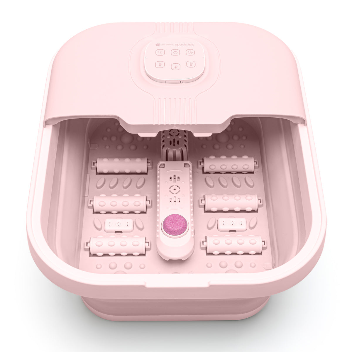 Interior view of foot spa with 6 reflexology rollers and built-in pumice stone for exfoliating foot care.