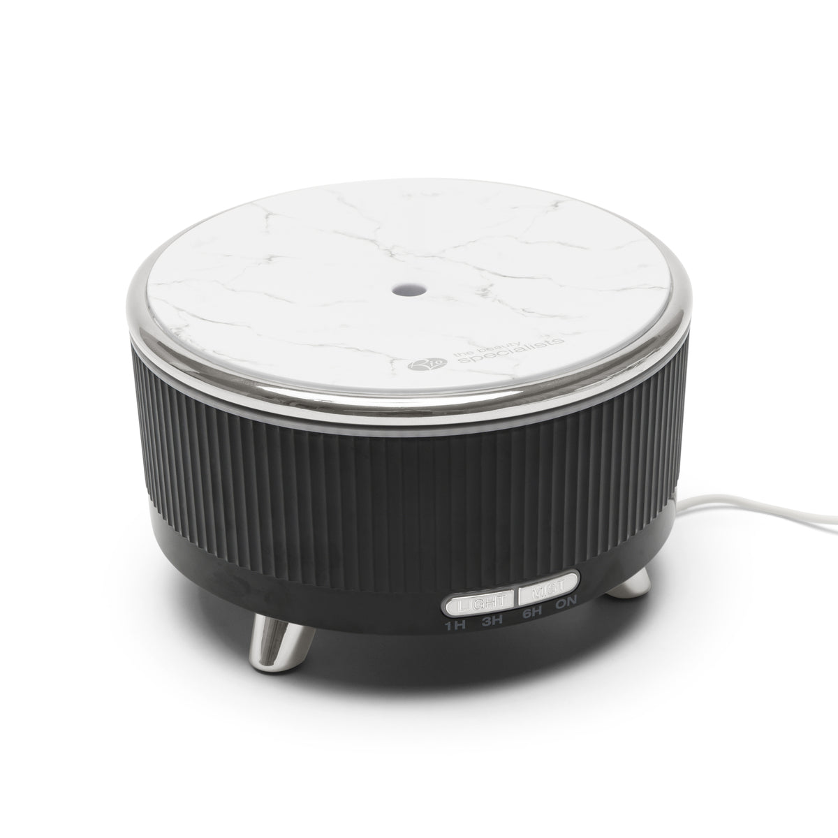 The Rio SONAS Aroma Diffuser, Humidifier & Night-Light features a round design with a white marble-patterned top, black ribbed sides, silver legs, timer options (1/3/6 hrs), and a white cord—ideal for aromatherapy and adding moisture to any room.