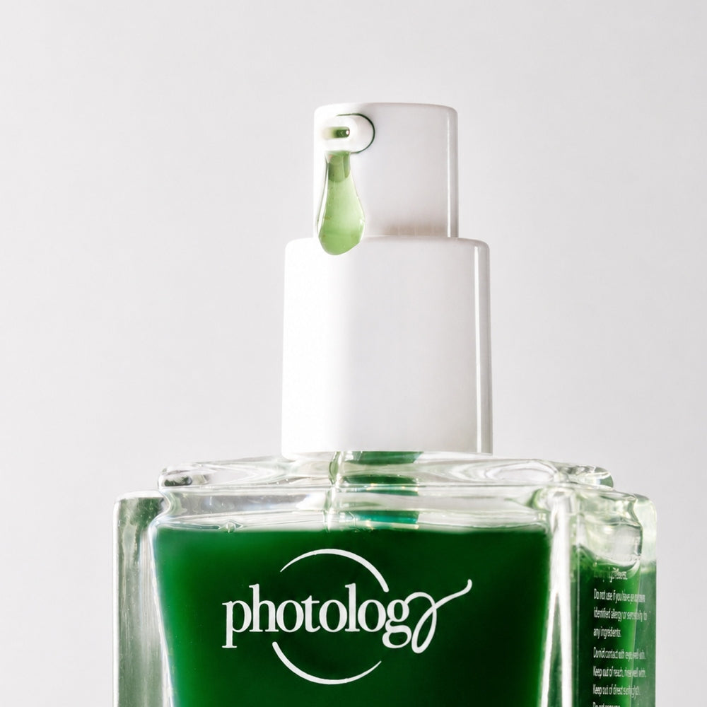 A close-up of Rio’s Photology Chlorophyll Light Serum Masque in a green bottle with a white pump, “photolog” on the front, set against a light background—ideal for pairing with LED Face Masks to boost skin elasticity.