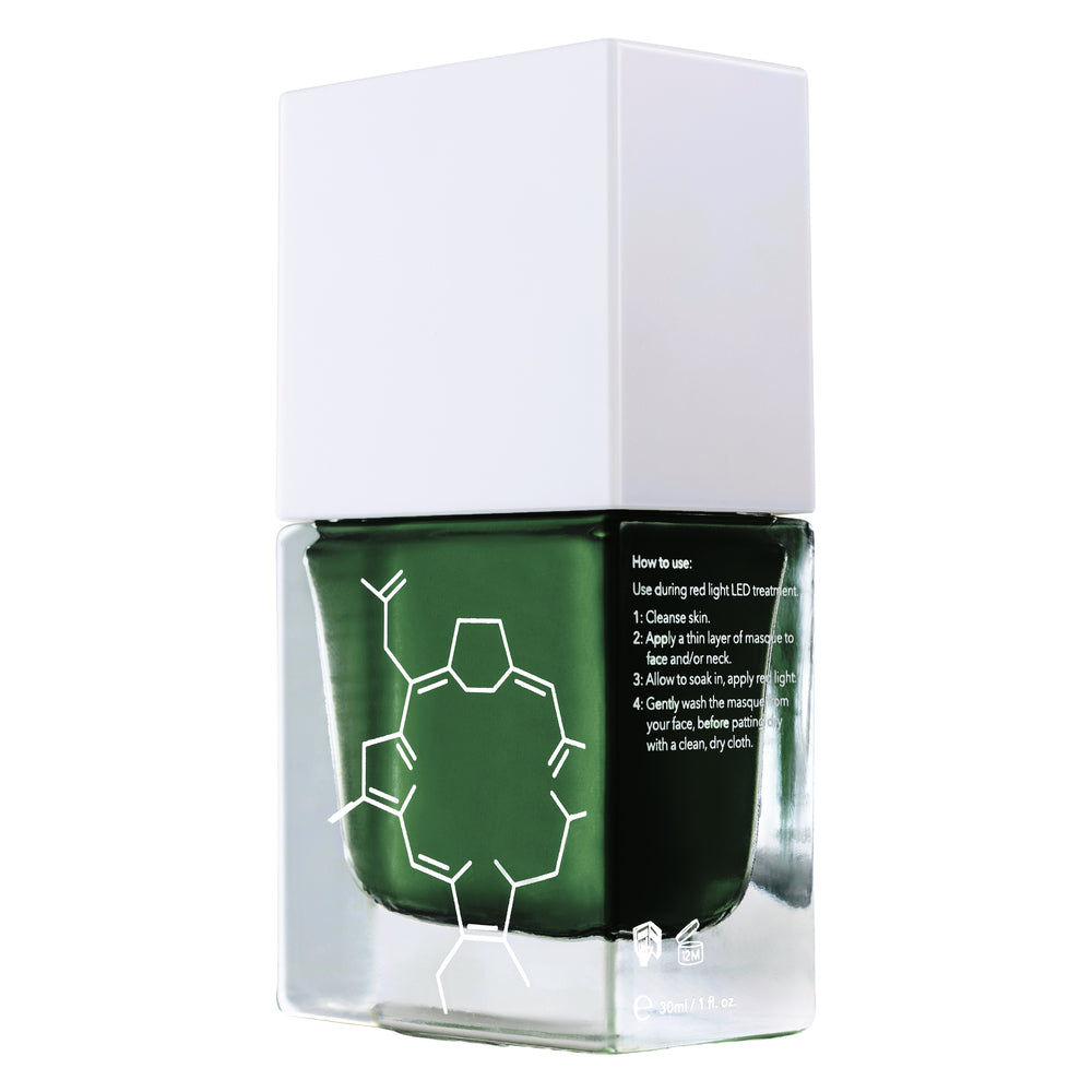 A square glass bottle of Rio’s Photology Chlorophyll Light Serum Masque in dark green, with a white cap. The bottle has a white chemical structure design inspired by LED Face Masks and application instructions on the side.