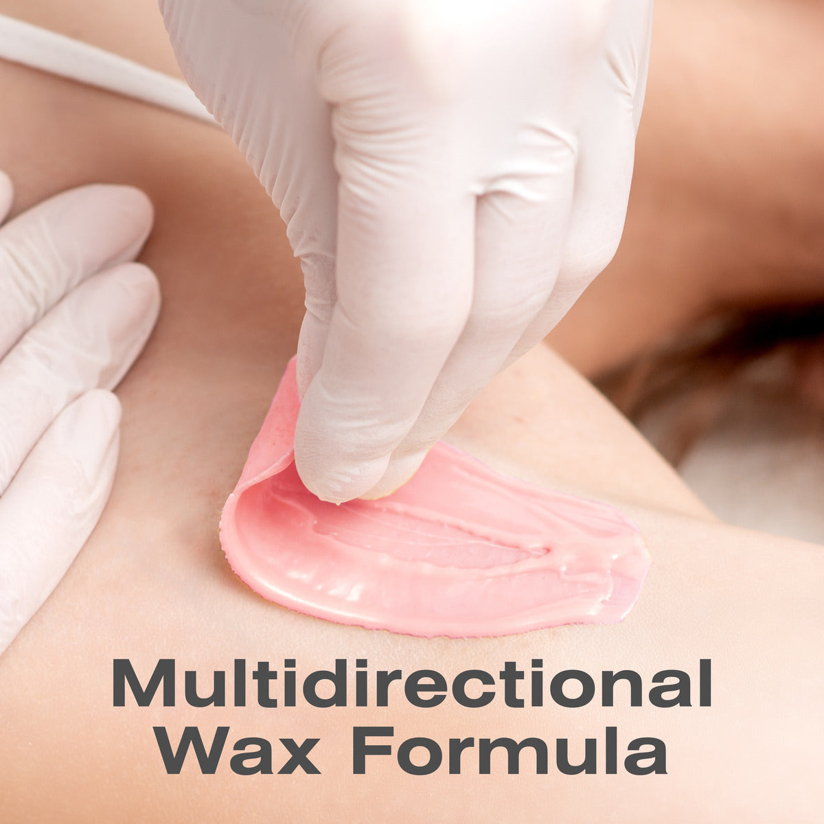 A gloved hand peels Rio Rose Go Smooth Stripless Hard Wax Beads (100g) from skin, revealing smooth results. The text Multidirectional Wax Formula appears at the bottom of the image.