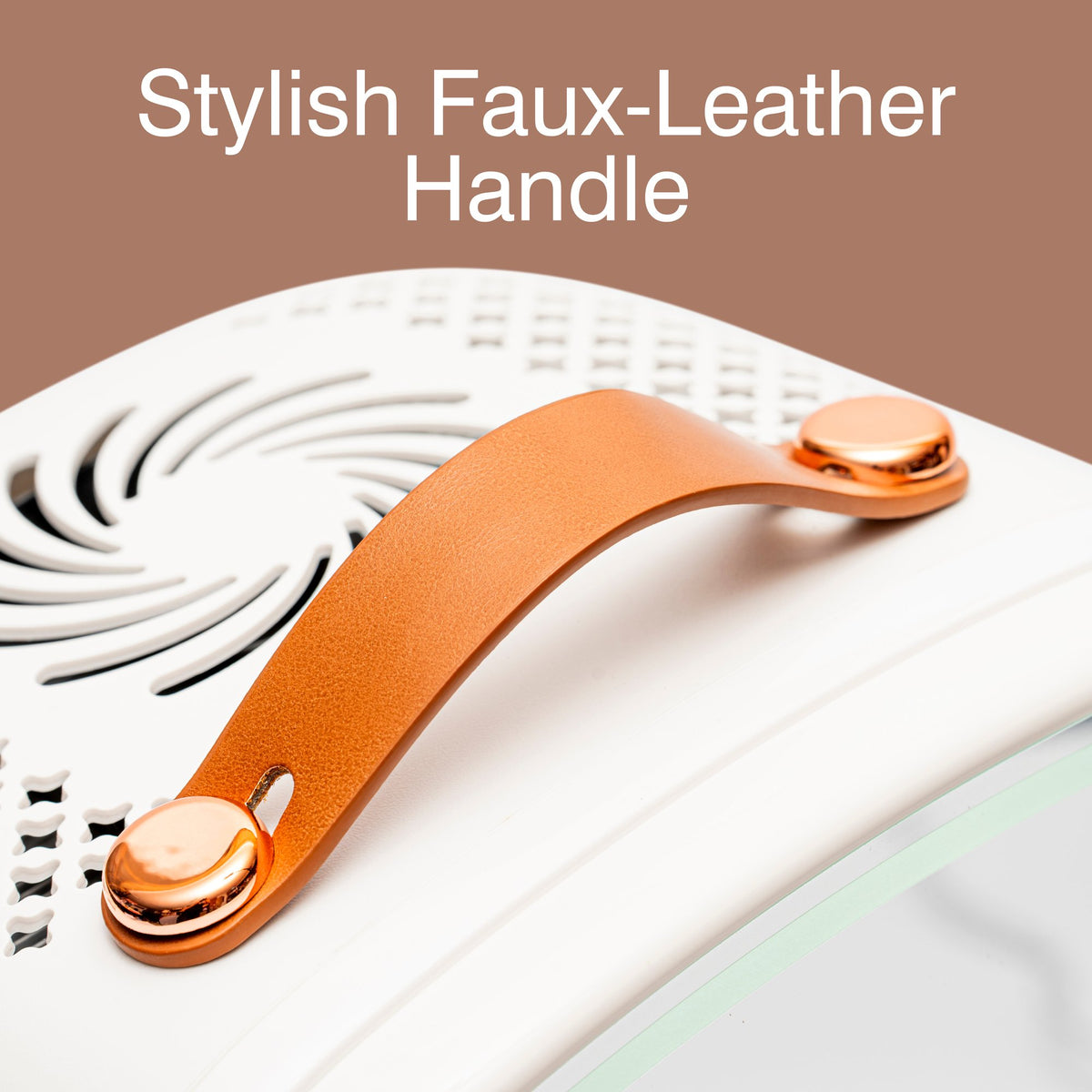Close-up of an orange faux-leather handle with gold-tone hardware attached to the Rio Beauty Skincare Fridge With Mirror, featuring ventilation holes and text above that reads Stylish Faux-Leather Handle—ideal for keeping your creams and cosmetics perfectly chilled.