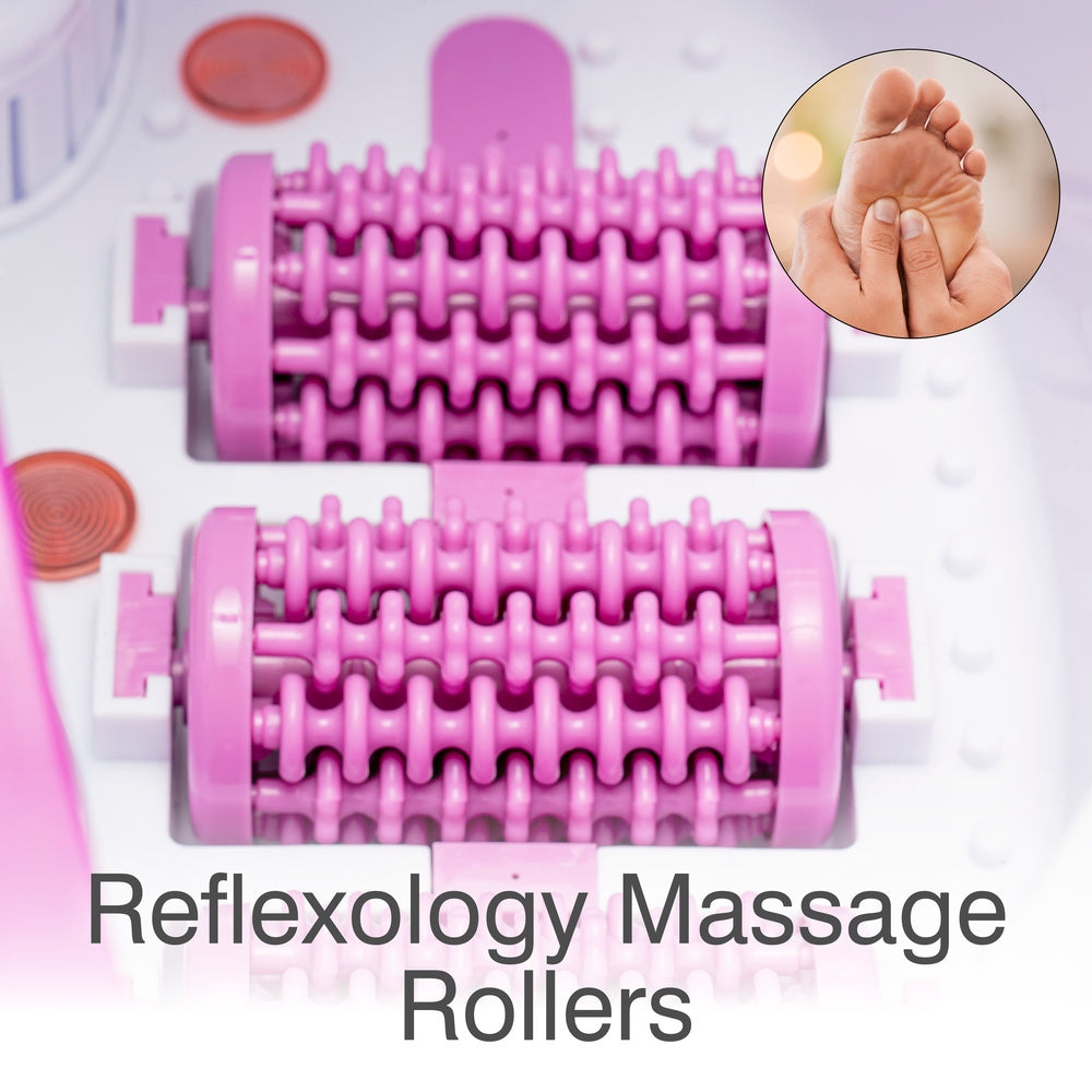 Close-up of two purple Deluxe Foot Spa Bath and Massager units by Rio, with a small inset image of hands massaging a bare foot; text below reads Deluxe Foot Spa Bath and Massager – Rio.