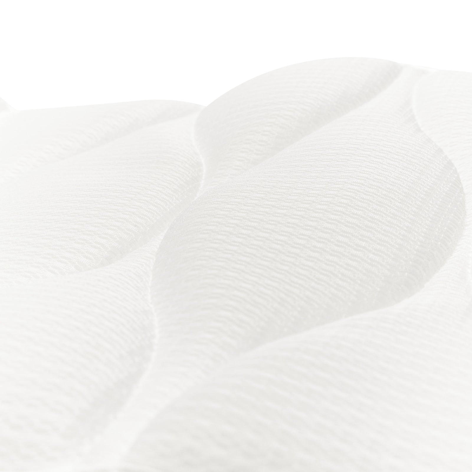 Close-up of the Rio Luxury Bath Mat & Pillow shows a white, textured surface with raised wavy patterns and soft quilted detail, highlighting the plush comfort and gentle contours of this premium product.