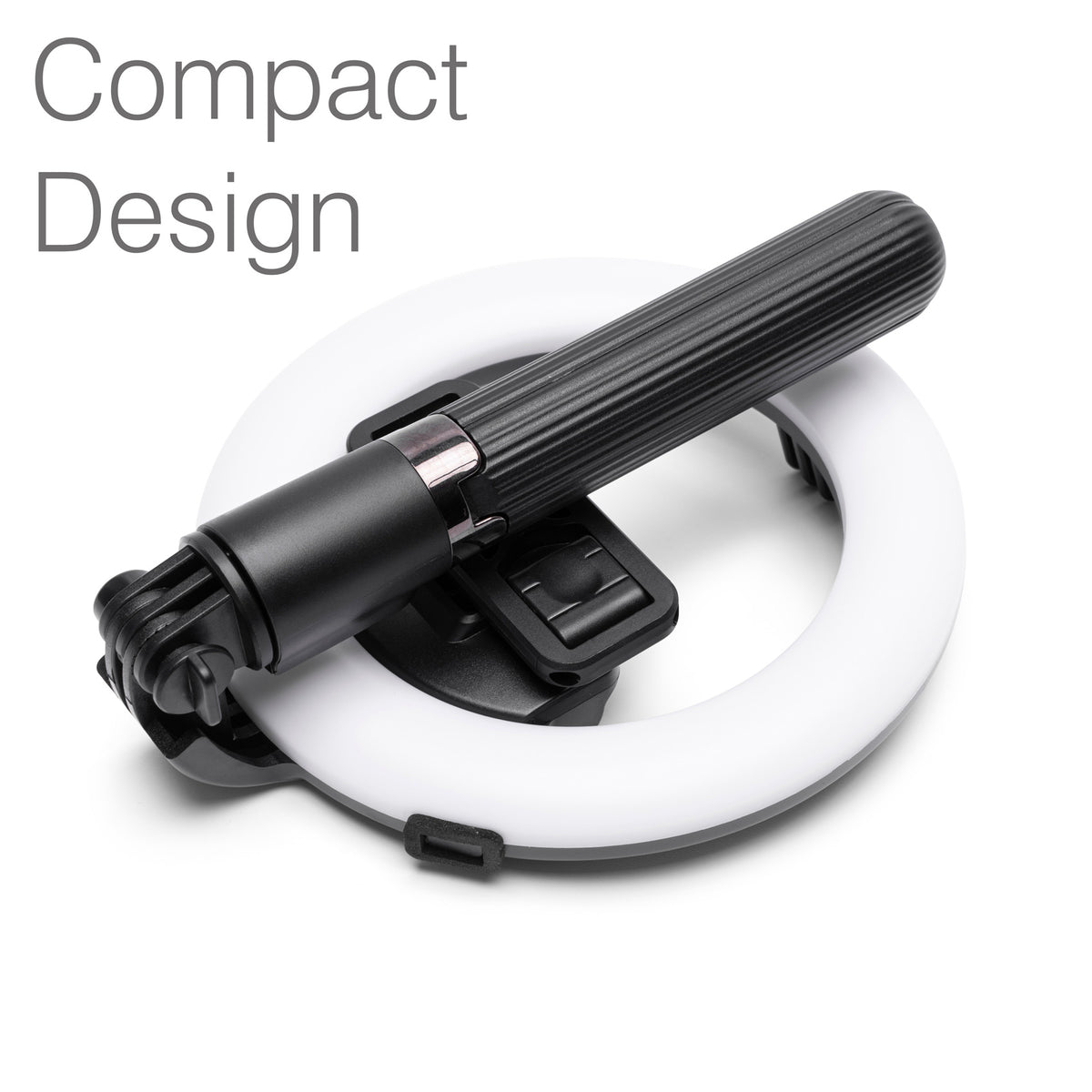 The Rio GlamourGlow Pro Beauty & Vlogging Ring Light features a black handheld device with a ribbed grip resting on its white circular light, perfect for vlogging. “Compact Design” is displayed in the top left corner.