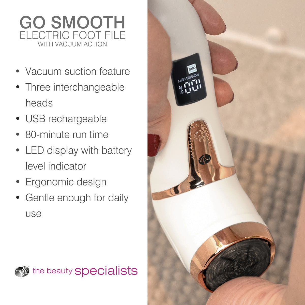 A hand holds the Rio Go Smooth Electric Foot File Hard Skin Remover with Vacuum Action above a heel. Features like vacuum suction, interchangeable heads, LED display, and ergonomic design are listed. Beauty specialists logo appears below.
