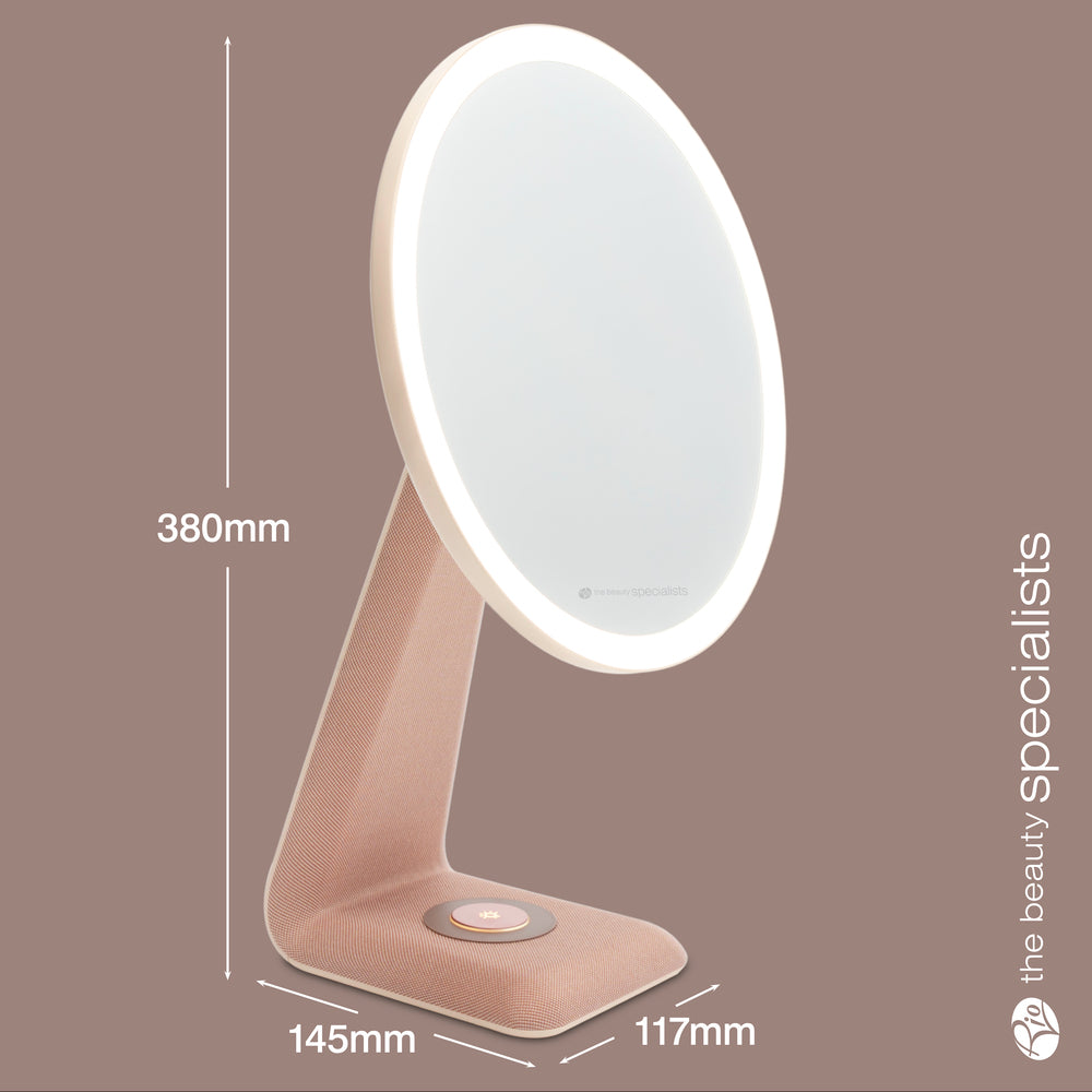 The Rio TrueColour High Performance Makeup Mirror features a modern oval LED design, high clarity, a beige base with touch button, and measures 380mm x 145mm x 117mm. "Beauty specialists" text is stylishly displayed on the right side.