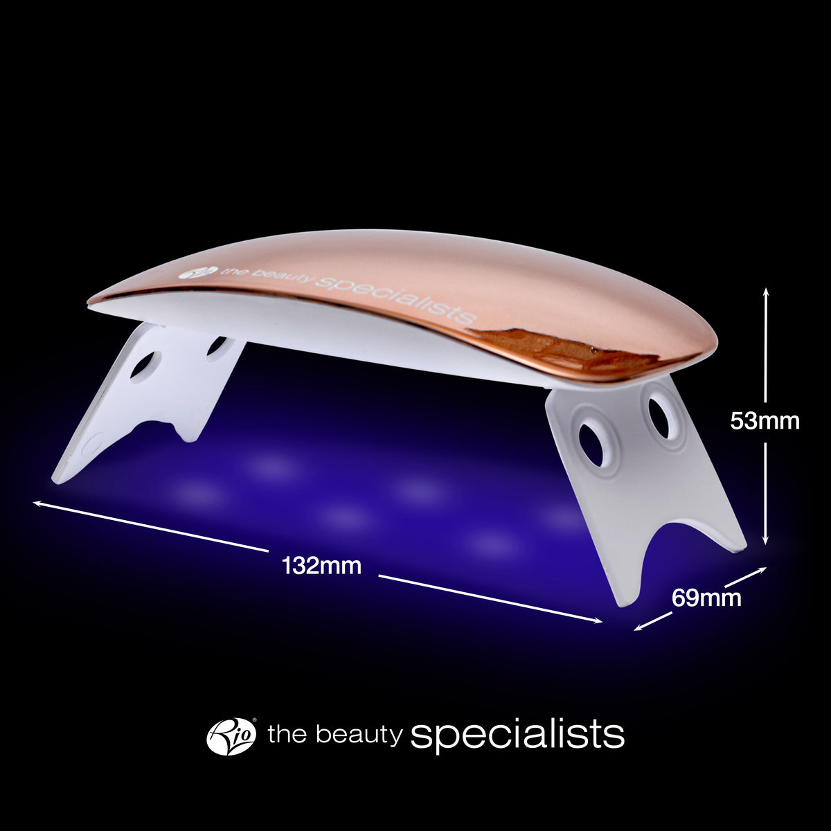 The Rio 14 Day Gel Polish Nails LED lamp in rose gold and white features blue light underneath, measures 132mm wide, 69mm deep, and 53mm tall, and displays the beauty specialists logo at the base—ideal for a professional manicure.