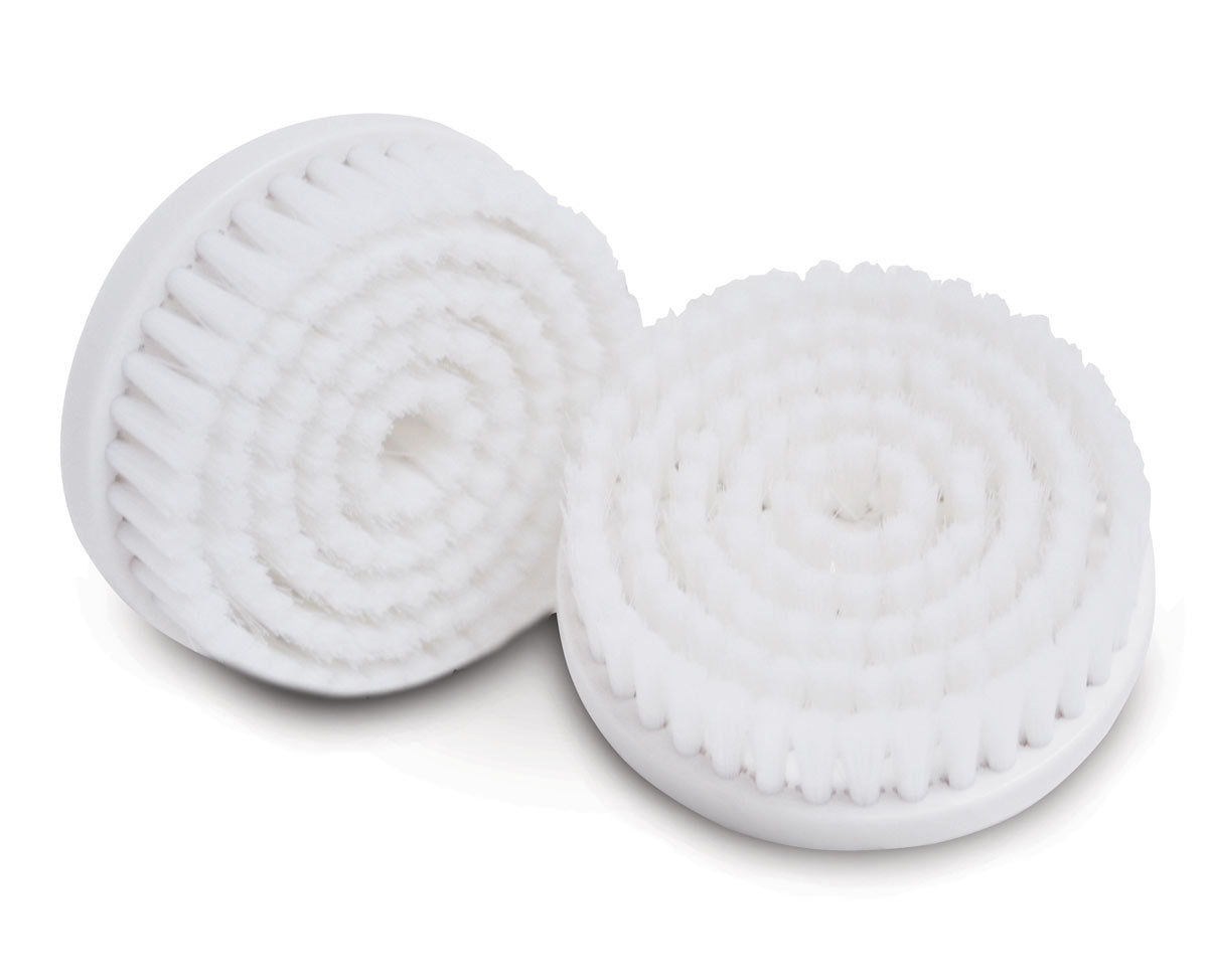Two Sonicleanse Replacement Heads X2 by Rio, featuring soft, densely packed white bristles in a spiral pattern, are shown side by side on a white background.