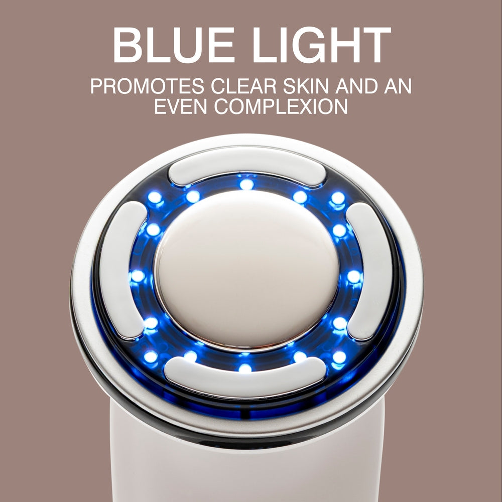 A close-up of the Rio FaceLift & Tone Beauty Spa emitting blue LED lights, with text above reading “BLUE LIGHT promotes clear skin and an even complexion” on a taupe background.