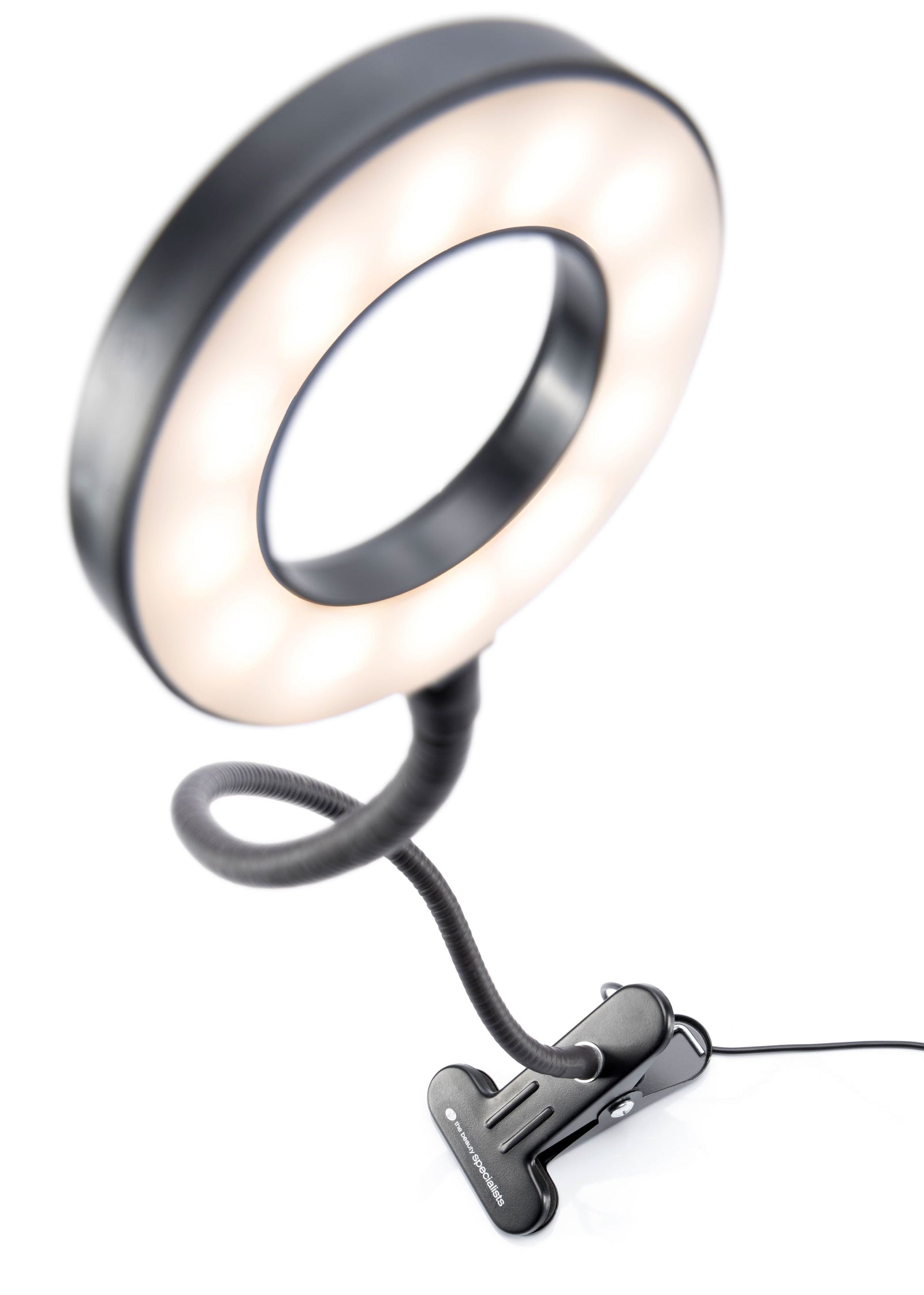 The Rio Beauty Station LED Ring Light features a circular design, flexible neck, and large clip base. Shown plugged in and illuminated against a white background, it offers versatile lighting for your needs.