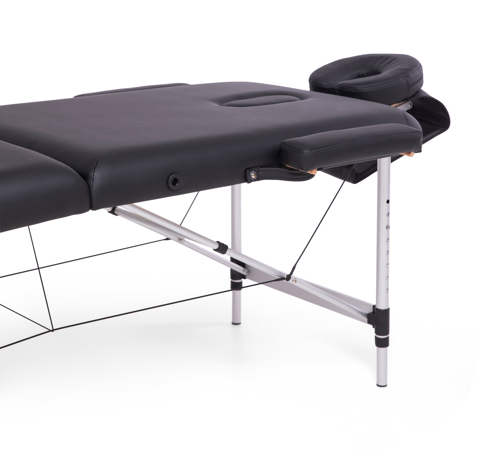 The Rio Professional Aluminium Massage Table & Treatment Couch features a black cushioned surface, adjustable face cradle, armrest shelf, and sturdy white metal legs—perfect for comfortable at-home massage sessions.