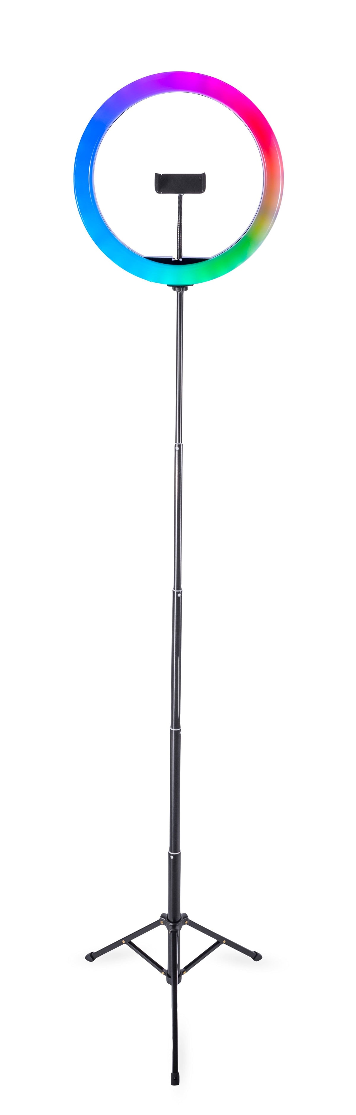 The Rio Studio RGB Beauty Ring Light features a tall tripod stand and a central smartphone holder. Its vibrant blue, pink, and green glow is ideal for enhancing your color photography.