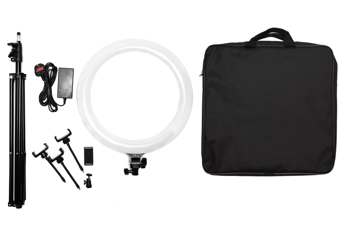 Photo of the Rio Professional Makeup & Vlogging 18-inch Dimmable LED Ring Light kit with black carrying case, power adapter, tripod stand, two phone mounts, camera remote—ideal for studio-quality makeup lighting or vlogging.