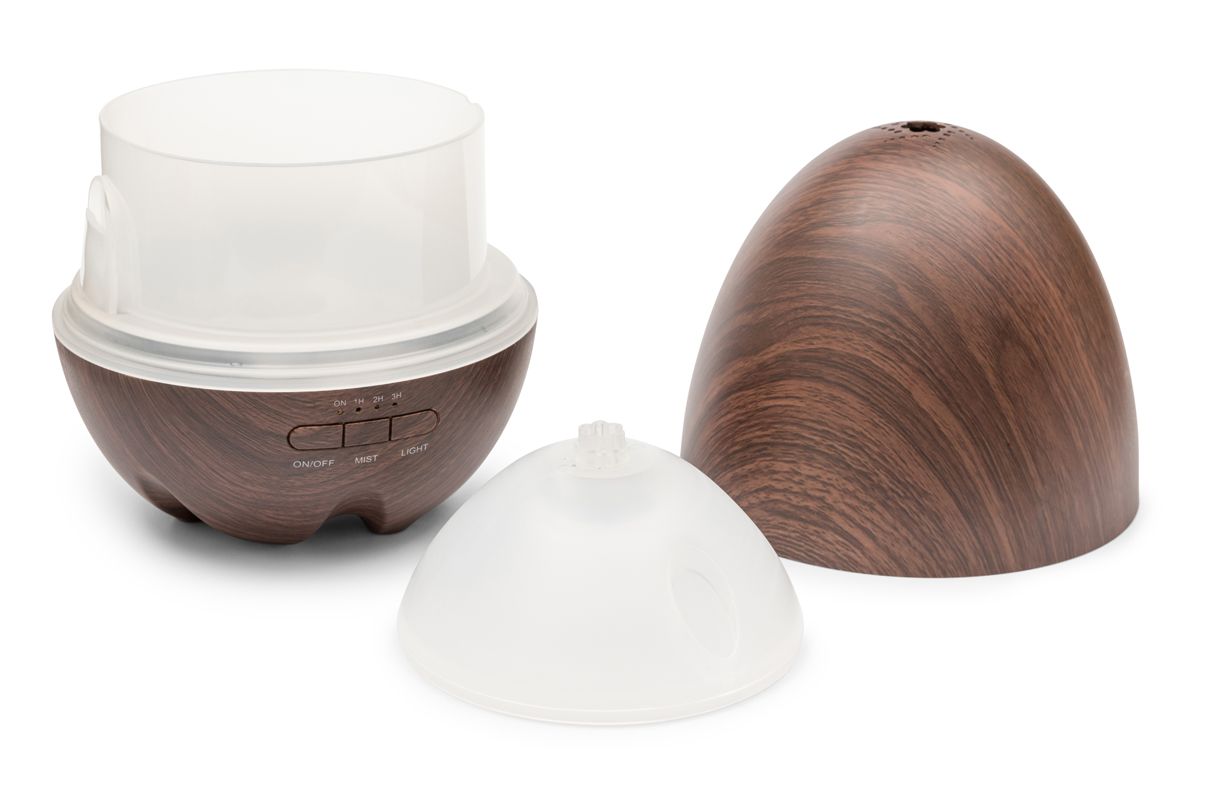 The disassembled ARIA Aroma Diffuser Humidifier and Nightlight by Rio, featuring a buttoned base, translucent middle cover, and dome-shaped wood-grain shell, enhances décor and relaxation, displayed on a white background.