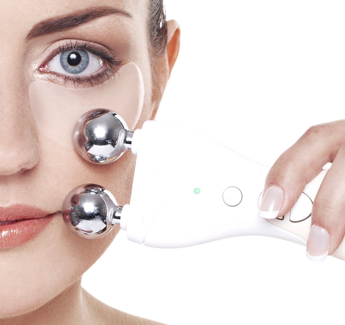 close up of a ladies face wearing an under eye collagen and retinol patch and using Rio 60 second face lift on cheek bone