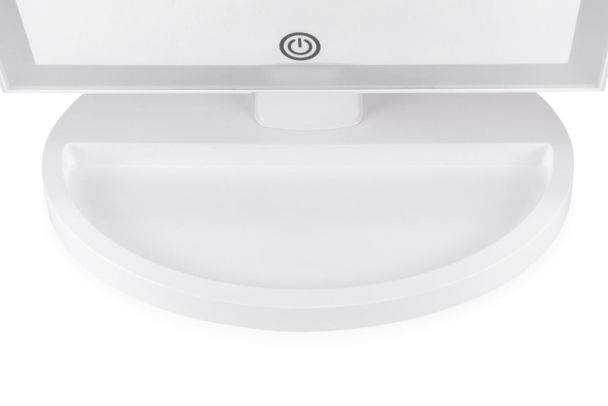 close up of base of mirror with built in storage compartment 