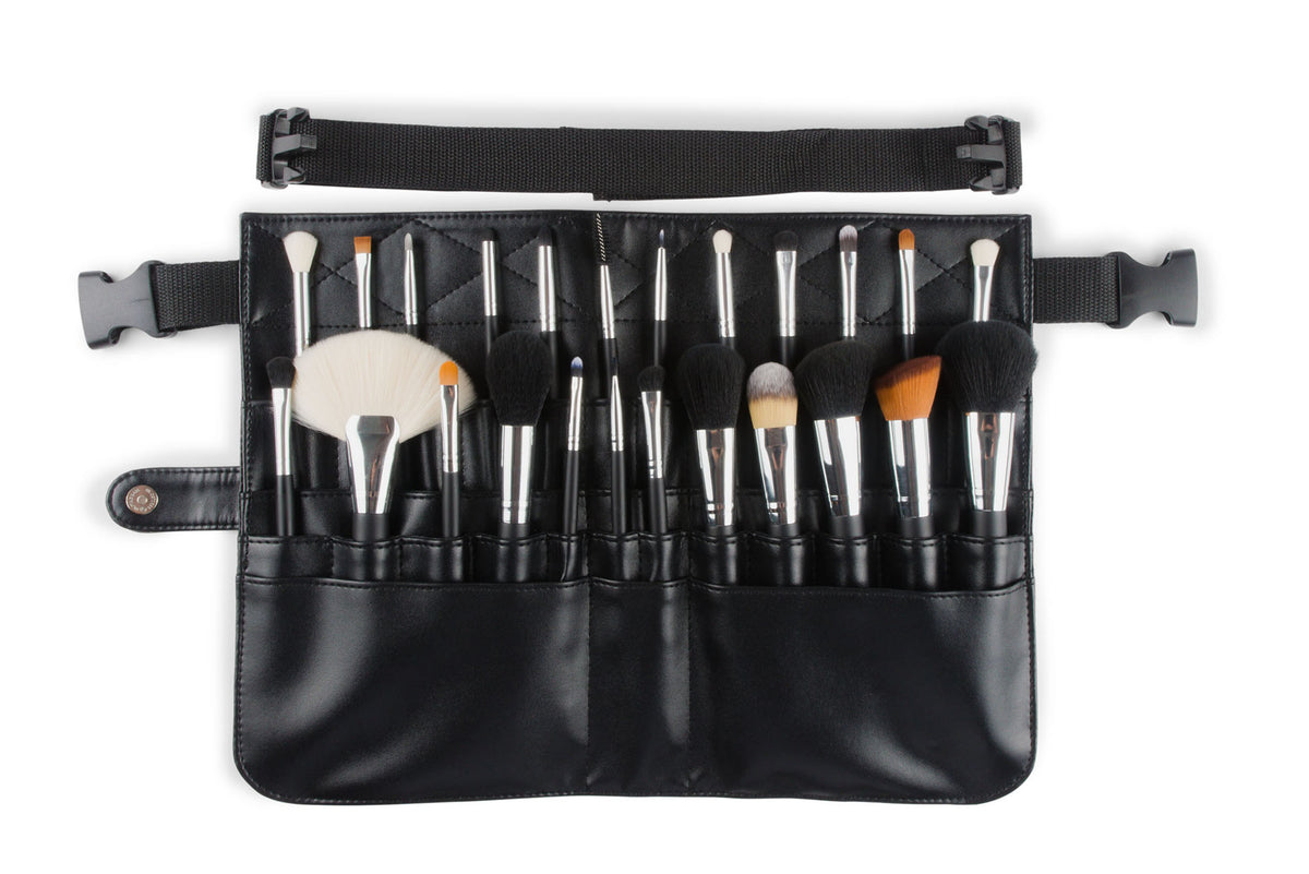 The Rio PROFESSIONAL SALON MAKEUP BRUSH COLLECTION & BELT features a black belt with a buckle strap, holding 24 makeup brushes in various shapes and sizes, displayed against a white background.
