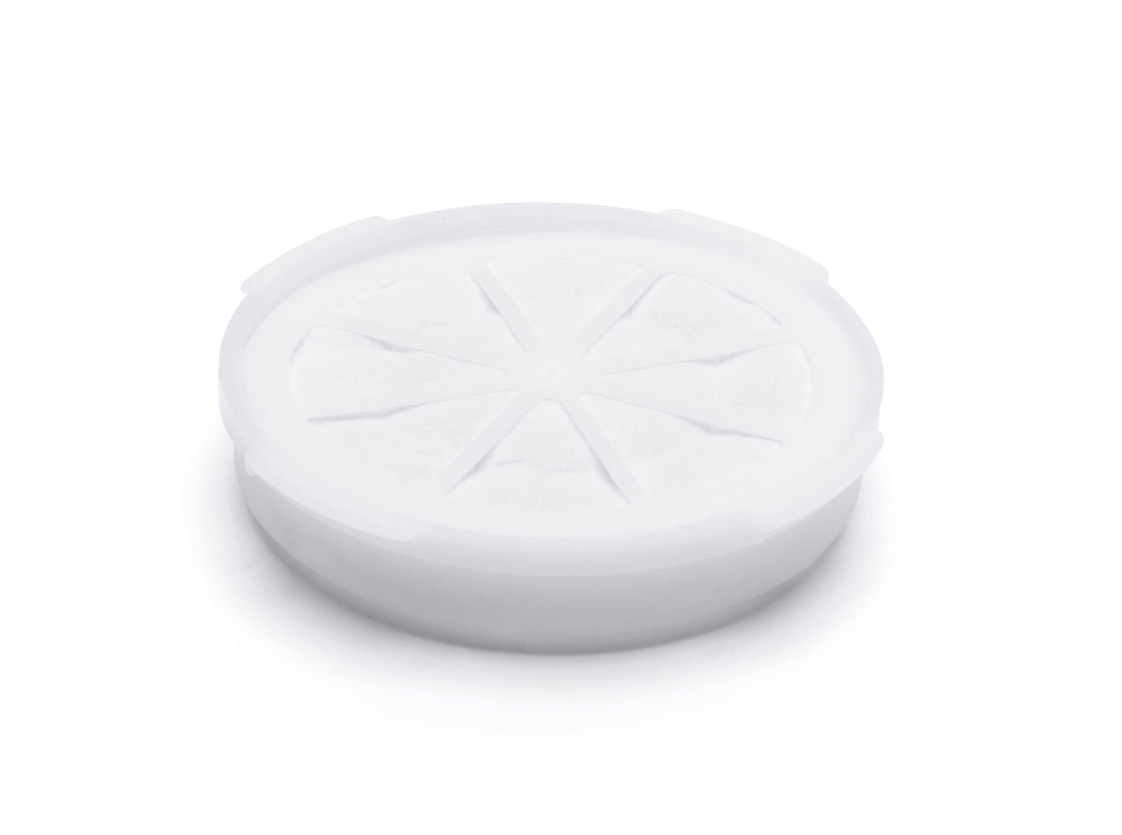 The Rio Aroma-Stream & Air Purifier Filter comes in a round, white plastic container with a citrus wedge embossed lid, designed to hold an Aromapad Filter. Shown on a plain white background.